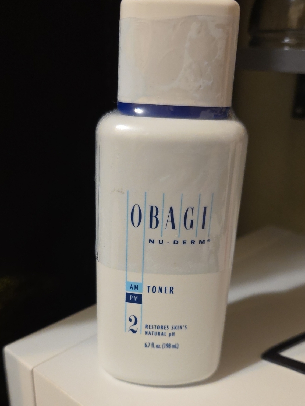 Obagi Nu-Derm Toner Bottle in White and Blue